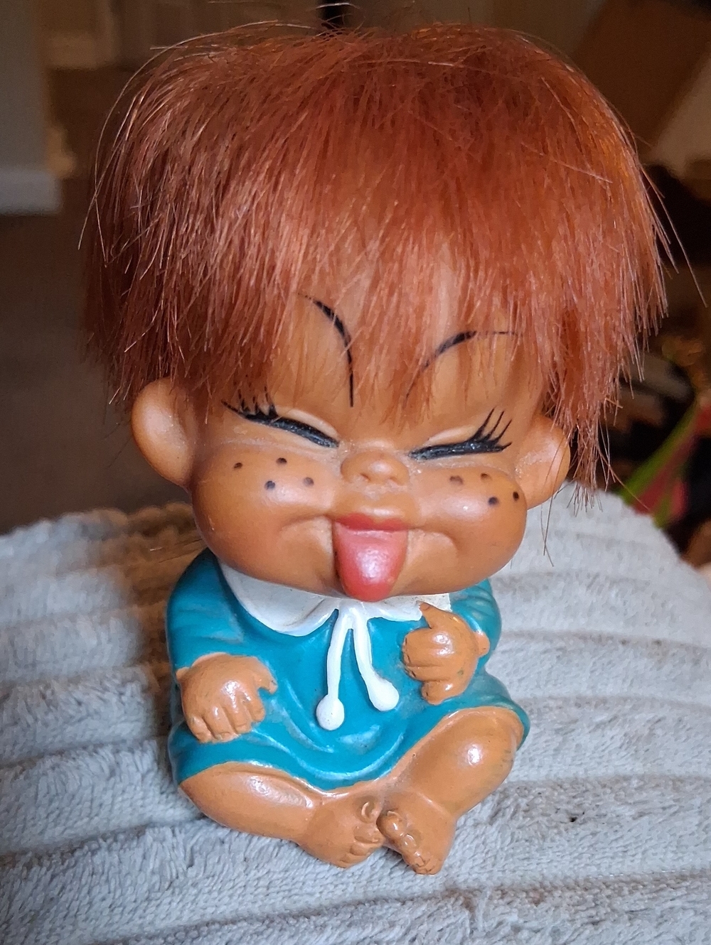 Cheerful Kids Doll Figurine in Teal Outfit with Red Hair